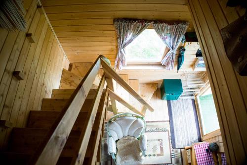 an overhead view of a staircase in a tiny house at Magia Krutyni in Krutyń