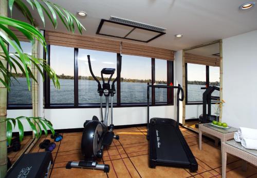 a gym with a view of the water at Movenpick MS Royal Lily Cruise - Luxor / Aswan - 04 Nights each Monday - 3 Nights each Friday in Luxor