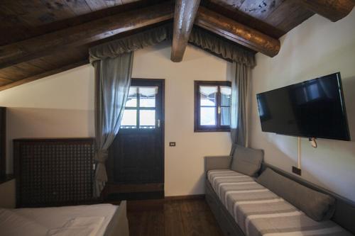 Postel nebo postele na pokoji v ubytování Hotel Rikhelan