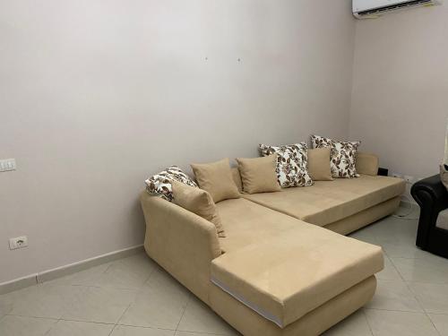 a living room with a couch in a room at Coastal, 2-bedroom rental unit in Golem