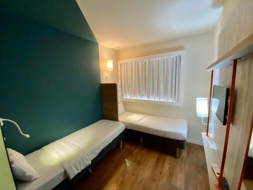 Katil atau katil-katil dalam bilik di ibis budget Itaperuna
