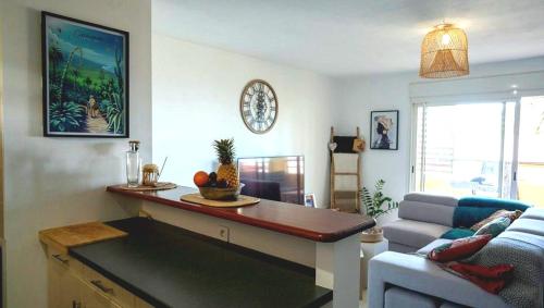 Posezení v ubytování La Vita Bella, Superbe Apt T2 récent de 46m2 à St Gilles l'Eperon à 8min des plages