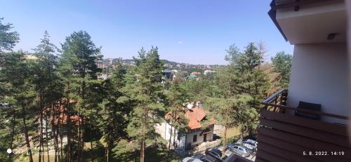 an overhead view of a city with trees and cars at BalkanHill2 S37 Pekovic green in Zlatibor
