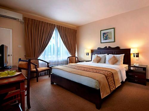 Cama o camas de una habitación en Berjaya Hotel Colombo