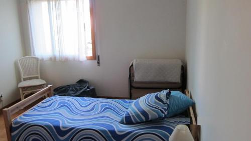Ένα ή περισσότερα κρεβάτια σε δωμάτιο στο Nibho Apartment