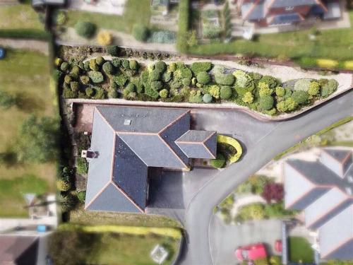 an overhead view of a road with a x at Luxury 4-5 Bed Home with Games Room and Balcony in Newtown
