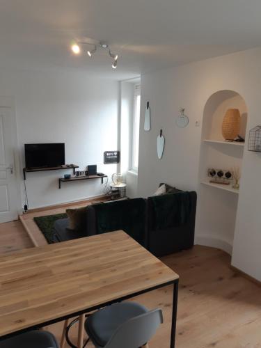 Televízia a/alebo spoločenská miestnosť v ubytovaní Cosy T2 31m2 - Centre-Ville Dijon - Gare et Darcy