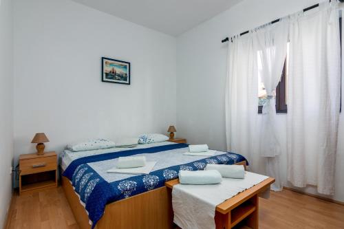Posteľ alebo postele v izbe v ubytovaní Apartments with a parking space Fazana - 18639