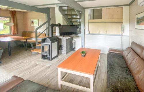 a living room with a couch and a table at Ferienhaus 39 In Kirchheim in Kirchheim