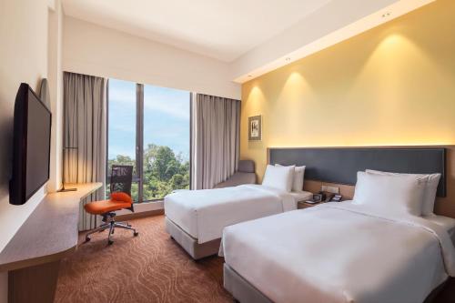 Postel nebo postele na pokoji v ubytování Holiday Inn Express Kota Kinabalu City Centre by IHG