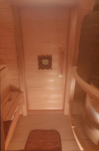 an empty bathroom with a toilet and a tub at Mt Ichibata Cottage in Izumo