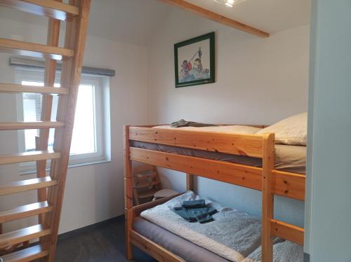 Ένα ή περισσότερα κρεβάτια σε δωμάτιο στο Haus MoorRose