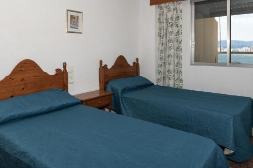 Postel nebo postele na pokoji v ubytování Florazar 2, Vi-11-C