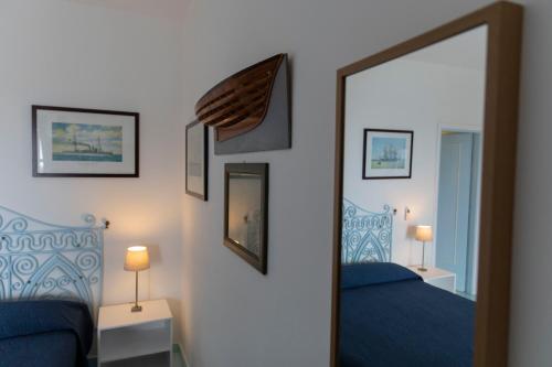 Postel nebo postele na pokoji v ubytování Hotel Agave e Ginestra