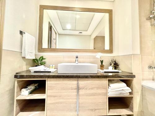 Ванная комната в GOODWOOD SUITES HOMES VACATION