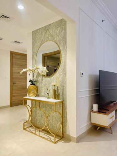 Телевизор и/или развлекательный центр в GOODWOOD SUITES HOMES VACATION
