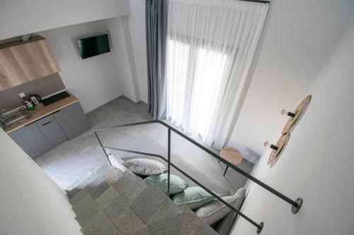 TV a/nebo společenská místnost v ubytování Heraclea Luxury Suites