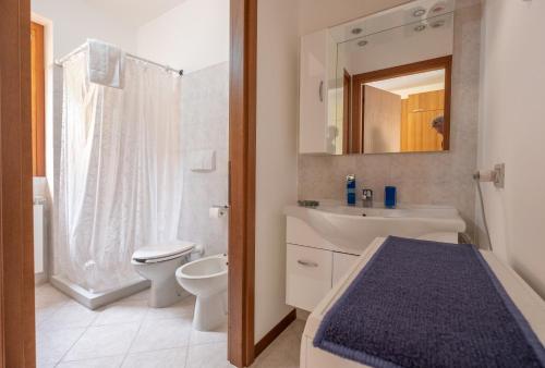 Kúpeľňa v ubytovaní Happy Guest Apartments - Lake Panorama & Pool