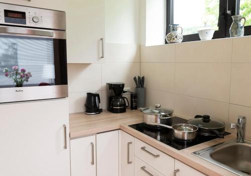 Η κουζίνα ή μικρή κουζίνα στο Wildbach Appartement