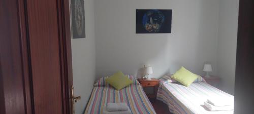 Postel nebo postele na pokoji v ubytování El Lomo