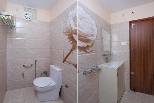 Bilik mandi di Upvan Guest House and Residence