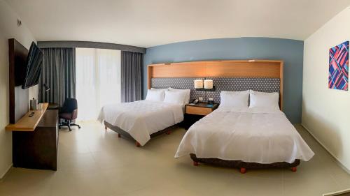 Postel nebo postele na pokoji v ubytování Holiday Inn Tuxpan - Convention Center by IHG
