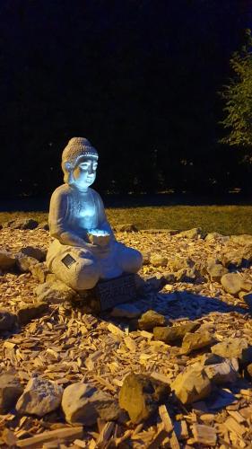 a statue of aitatingitatingitatingitatingitatingitatingitatingitatingitatingitatingitatingfficient at Agréable chambre d'hôtes, au calme, dans la nature in Roches
