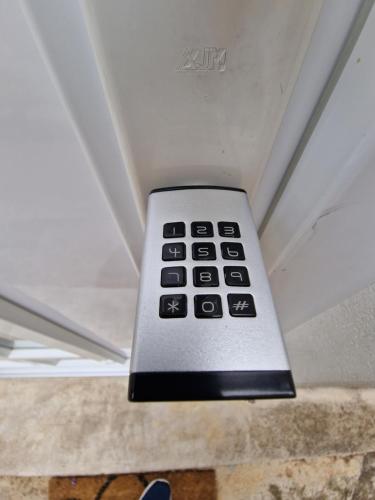 a remote control is hanging from a ceiling at Beautiful house Lanna in Izola