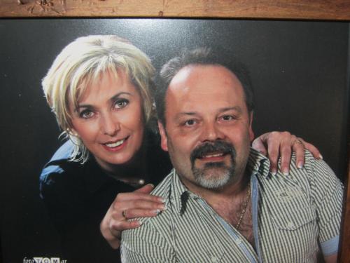 a woman and a man posing for a picture at Hotel Garni Landhaus Trenkenbach in Schladming