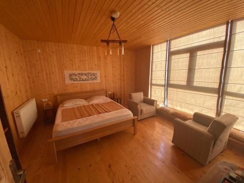 Ein Bett oder Betten in einem Zimmer der Unterkunft Chateau Chao