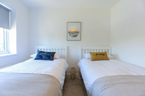 Katil atau katil-katil dalam bilik di 'Elements' 3 bed home in Bracklesham Bay