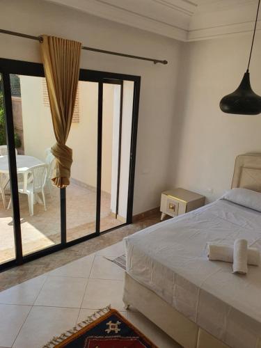 Кровать или кровати в номере Superbe villa avec piscine privée