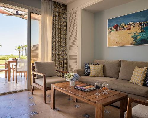 a living room with a couch and a table at Four Seasons Hotel Alexandria At San Stefano in Alexandria