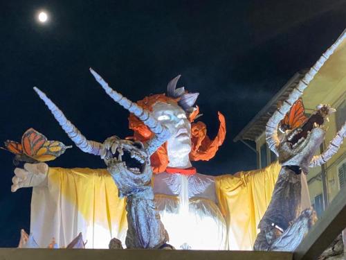 a large statue of a dragon on a building at Vicolo Curtatone 30 in Foiano della Chiana