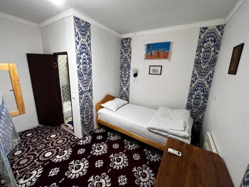 Lova arba lovos apgyvendinimo įstaigoje Polvonnazir Guest House