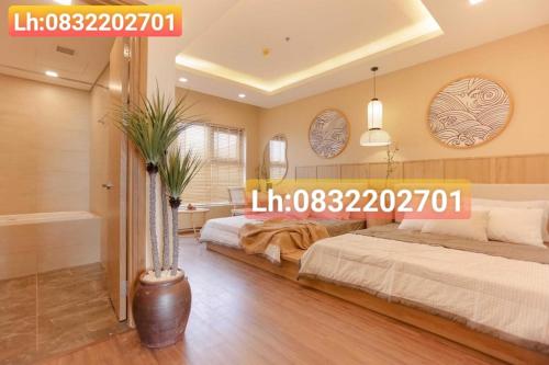 Postel nebo postele na pokoji v ubytování FLC Sea CHANH Apartment - Căn Hộ Hướng Biển Trung Tâm TP Quy Nhơn