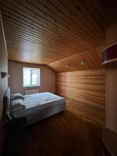 En eller flere senge i et værelse på Casa Centru Chișinău