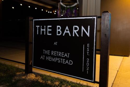 a sign that reads the barn at the retreat at hermetically at The Retreat at Hempstead in Hempstead