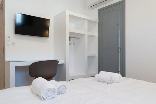 Ένα ή περισσότερα κρεβάτια σε δωμάτιο στο Bedspot Apartments Astipalaia