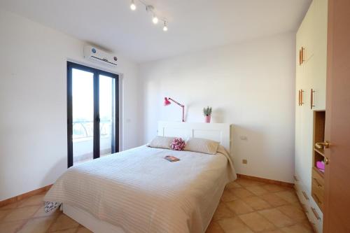 Ένα ή περισσότερα κρεβάτια σε δωμάτιο στο Micaene Duplex - Pineto Vacanza