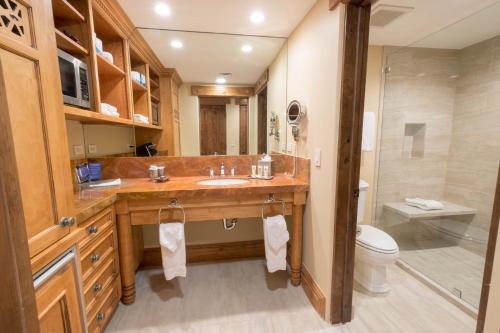 a bathroom with a sink and a toilet at The Chateaux Deer Valley in Park City