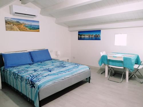 Una cama o camas en una habitación de Donnaciccinatrapani