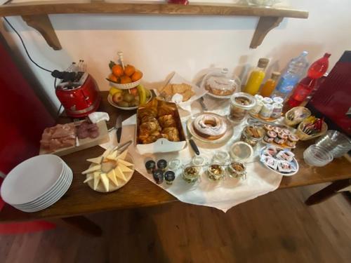 a table with many different types of food on it at La Magnolia in Greve in Chianti