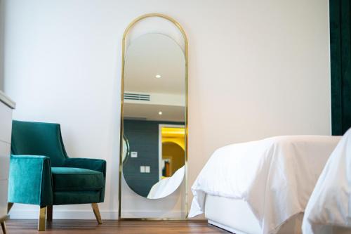 Кровать или кровати в номере Casa Cuarzo Hotel Boutique