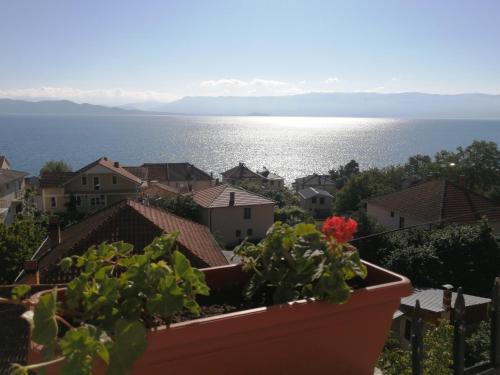 a view of the ocean from a town at Vila Vista Magica Radozda in Struga