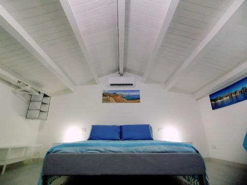 Una cama o camas en una habitación de Donnaciccinatrapani