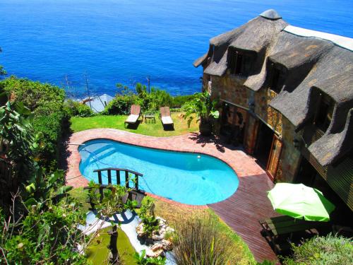 an image of a house with a swimming pool at A Whale of a Time in Fish Hoek