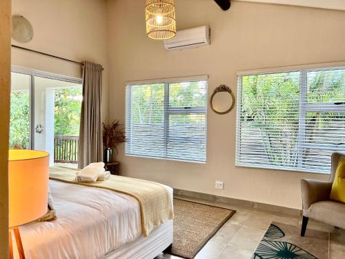 Letto o letti in una camera di Bushbaby Valley Lodge