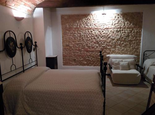 Postel nebo postele na pokoji v ubytování B&B La Noce