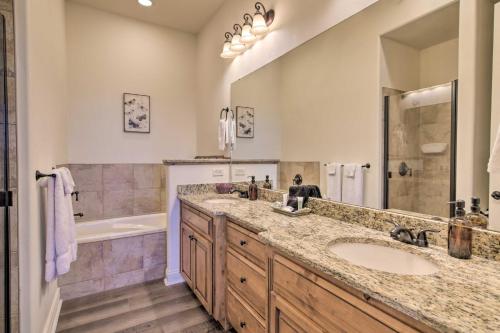 a bathroom with a large sink and a tub and a shower at Luxe Mtn-View Condo in Branson with Hot Tub Access! in Branson